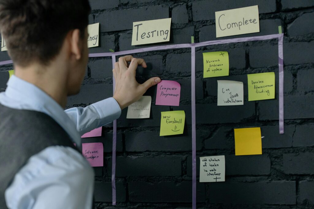 Person looking at a vision board and visualizing success.